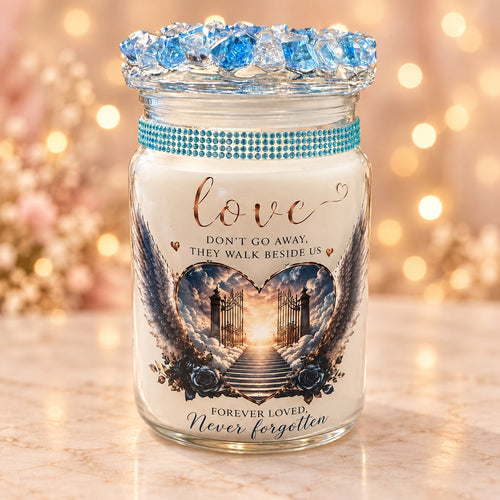 Blue Jewel Memorial Candle on a warm golden studio backdrop